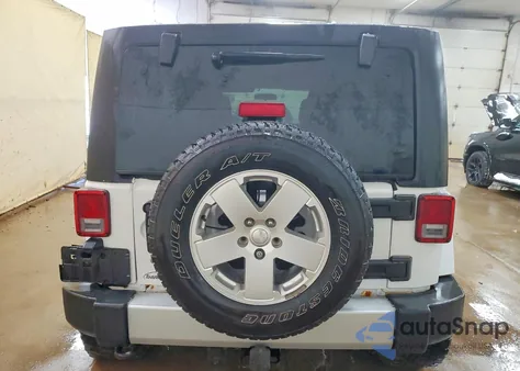 2012 Jeep Wrangler Unlimited Sahara z USA, uszkodzony, nr VIN 1C4BJWEG0CL183580